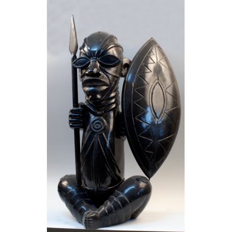 Figura de guerrero-cazador africano, con escudo y lanza.