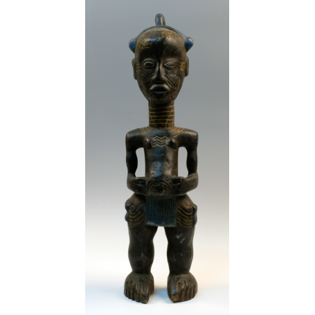 Estatua masculina baulé, en madera policromada.