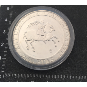 Moneda en plata conmemorativa de los XXV Juegos Olímpicos.