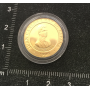 Pièce de monnaie à l'or fin pour commémorer le XXV Jeux Olympiques.