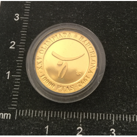 Moneda en oro fino conmemorativa de los XXV Juegos Olímpicos.