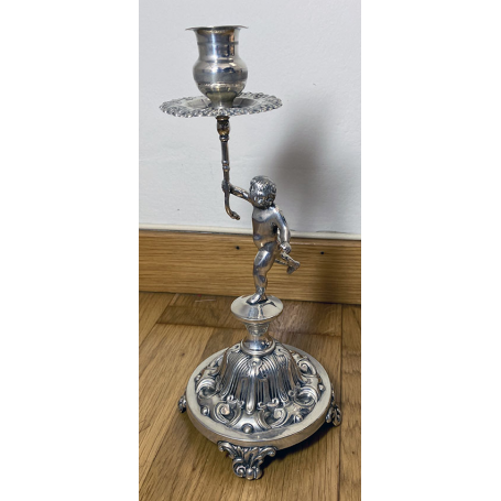 Candlestick in gallonized English silver.