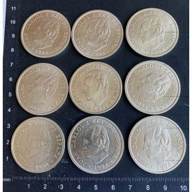 9 Silbermünzen 2000 Peseten.