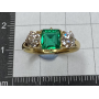 Ring in 18k gold, emerald, and diamonds.