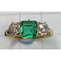 Ring in 18k gold, emerald, and diamonds.