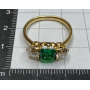 Ring in 18k gold, emerald, and diamonds.