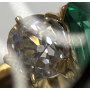 Anello in oro 18k, con smeraldo e diamanti.