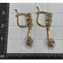 Boucles d'oreilles en or 18 carats avec des diamants.