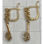 Earrings in 18k gold with diamonds.