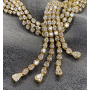 Halskette aus Gelbgold besetzt mit Diamanten.